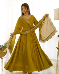 Mehndi Yellow Color Plain Gown With Work Dupatta