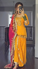 Punjabi Style Orange Color Georgette Sequence Work Lehenga With Top With Pink Dupatta