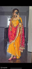 Punjabi Style Orange Color Georgette Sequence Work Lehenga With Top With Pink Dupatta