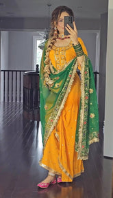 Punjabi Style Orange Color Georgette Sequence Work Lehenga With Top With Green Dupatta