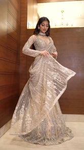 Glamorous Beige Butterfly Net Saree with Sequin Embroidery & Full-Stitched Blouse