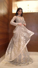 Glamorous Beige Butterfly Net Saree with Sequin Embroidery & Full-Stitched Blouse