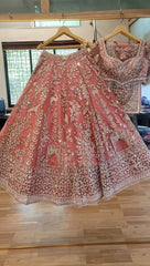 Glorious Pink Net With Embroidery Work Lehenga Choli