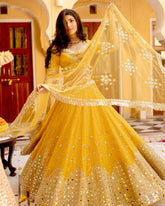 Awesome Yellow Georgette Mirror Work Lehenga Choli