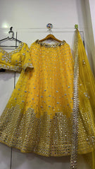 Awesome Yellow Georgette Mirror Work Lehenga Choli