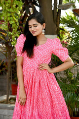 Gorgeous Pink Color Rich Print With Plated Gown