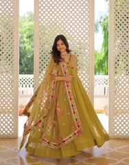 Mesmerizing Sequins Work Pista Color Gown