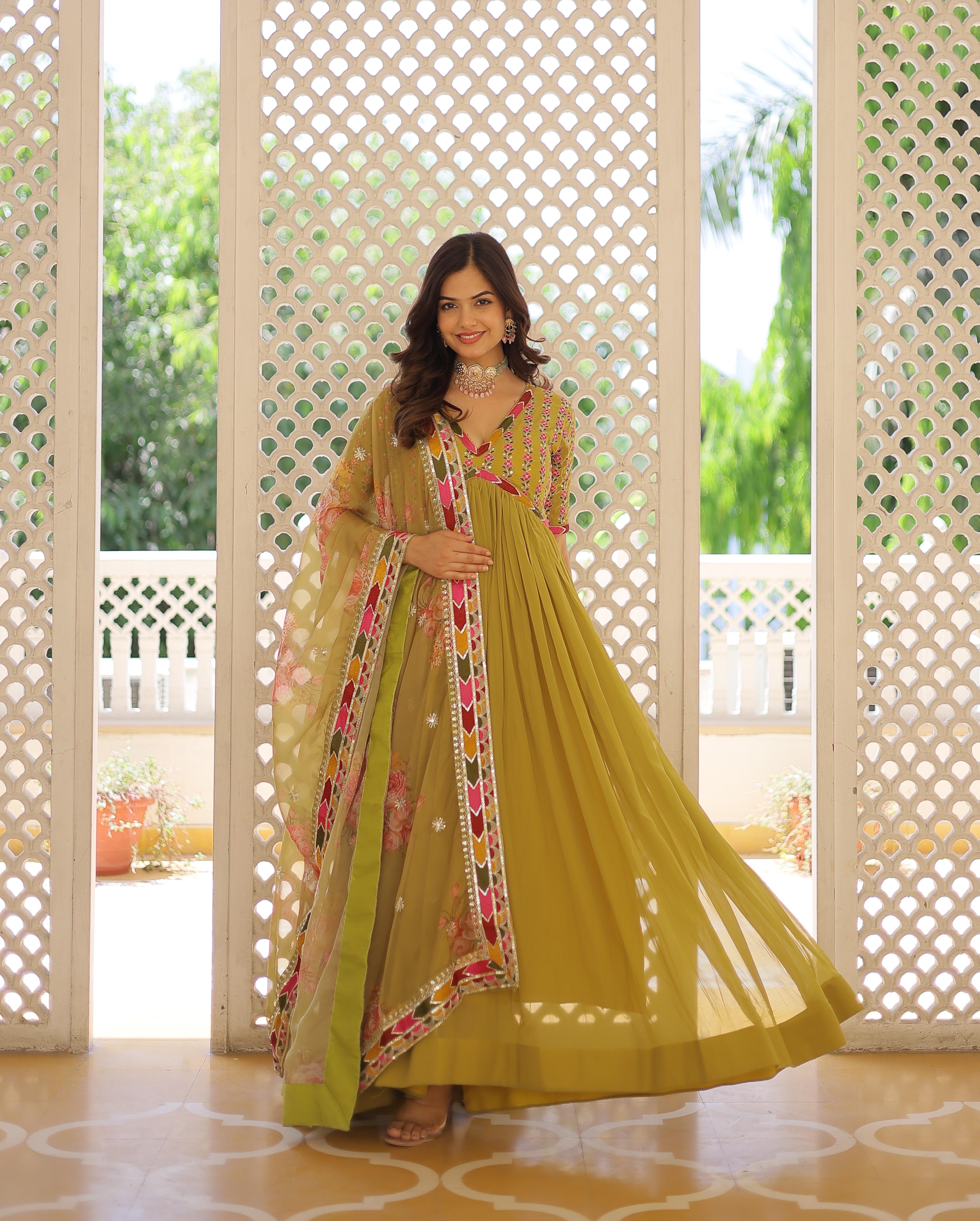 Mesmerizing Sequins Work Pista Color Gown