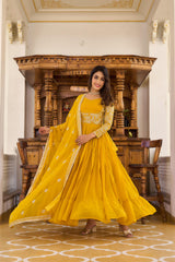 Delightful Ruffle Style Yellow Color Sequence Work Gown