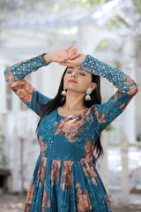 Graceful Embroidery Work With Printed Teal Blue Color Gown