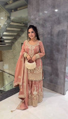 Blissful Heavy Embroidery Sequence Work And Full Sleeve Peach Color Plazo Suit
