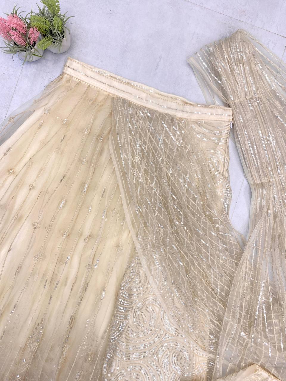 Glamorous Beige Butterfly Net Saree with Sequin Embroidery & Full-Stitched Blouse