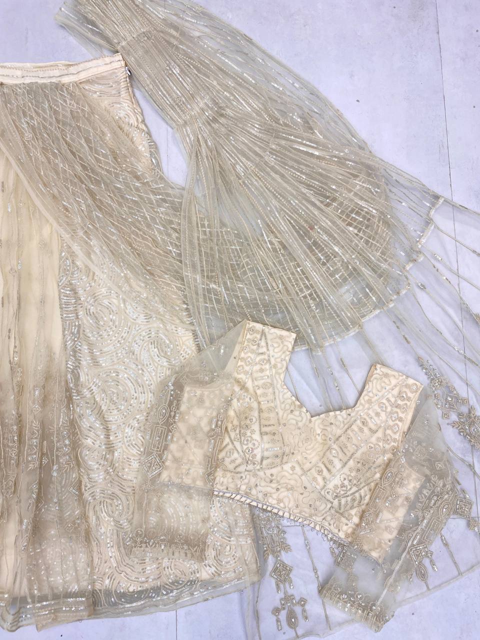 Glamorous Beige Butterfly Net Saree with Sequin Embroidery & Full-Stitched Blouse