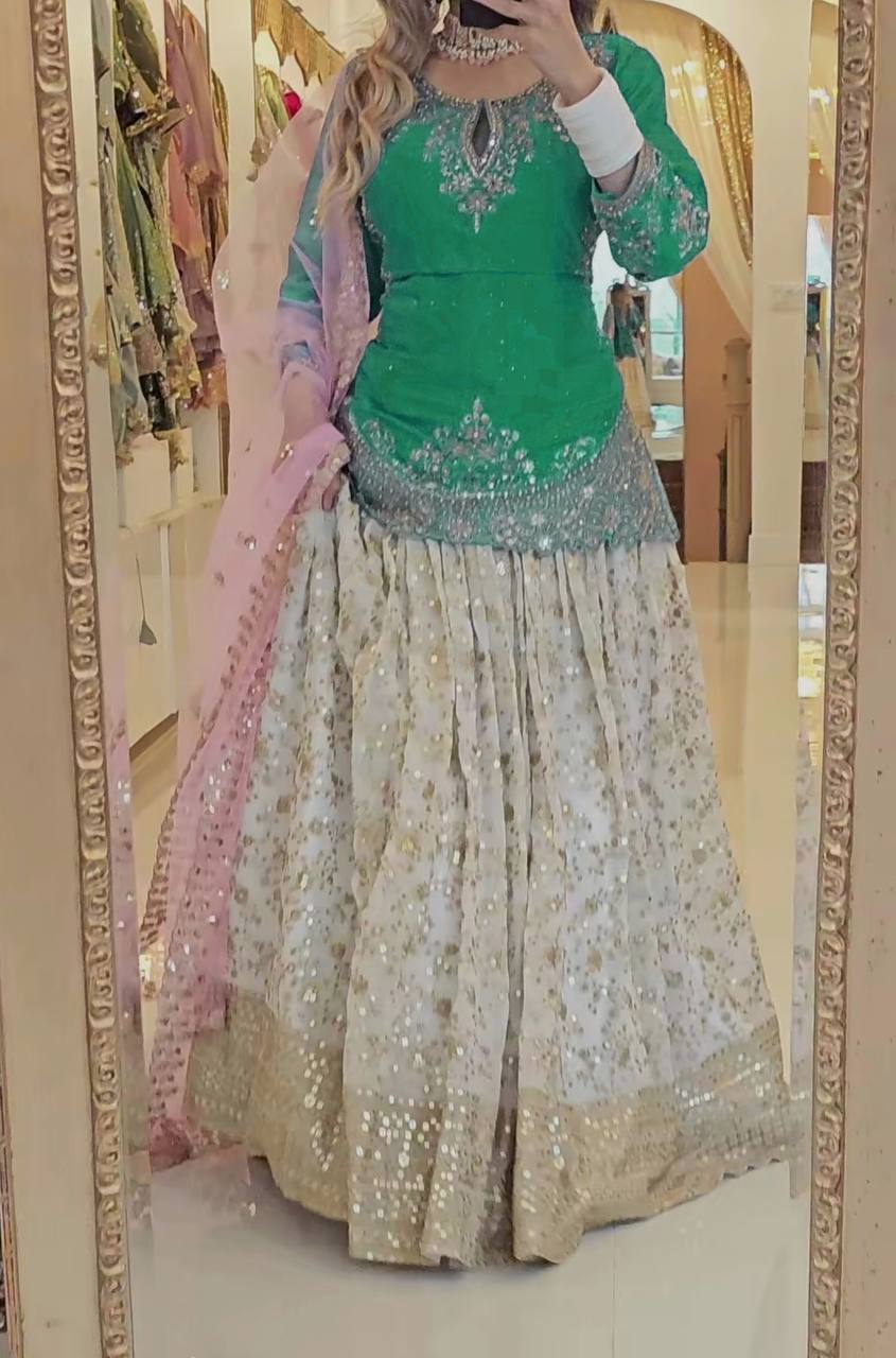 Punjabi Style White Color Chinon silk Sequence Work Lehenga With Green Top With Dupatta