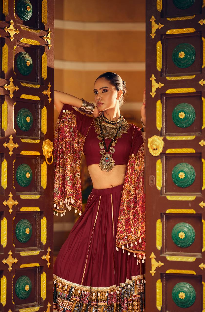 Ravishing Teal Blue Rayon With Foil Print Lehenga Choli