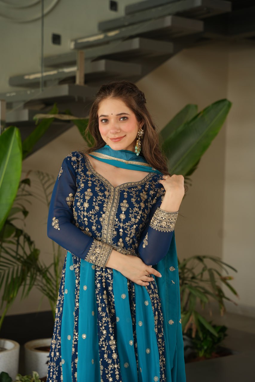 Attractive Purple Blooming Zari Work Gown