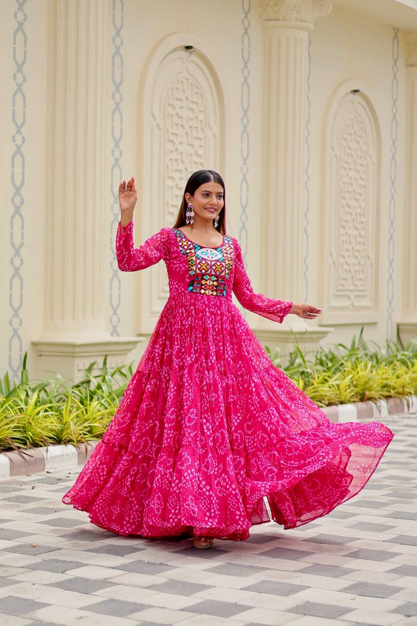 Ravishing Orange Georgette Gamthi Work Gown For Navratri