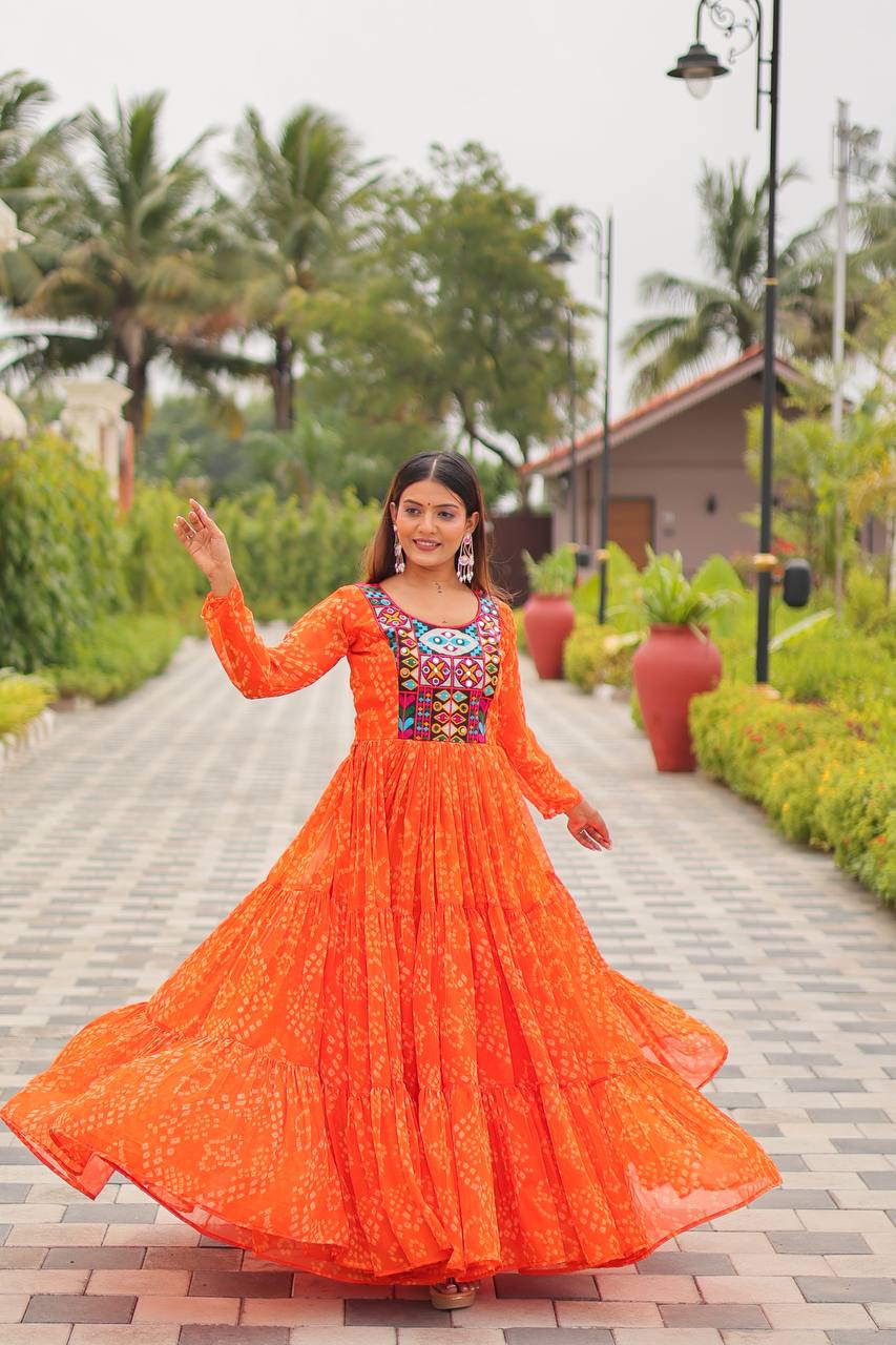 Ravishing Orange Georgette Gamthi Work Gown For Navratri