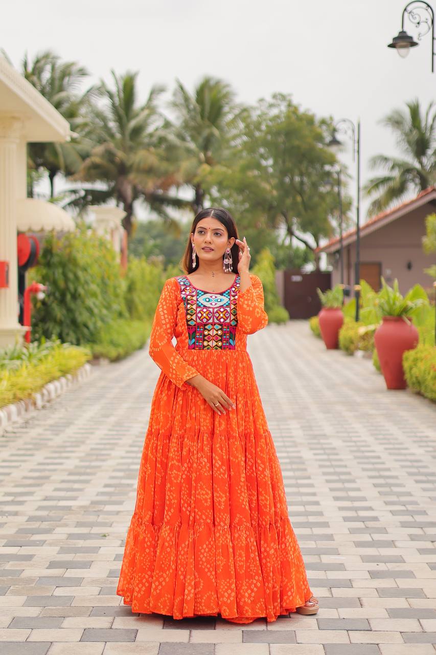 Ravishing Orange Georgette Gamthi Work Gown For Navratri