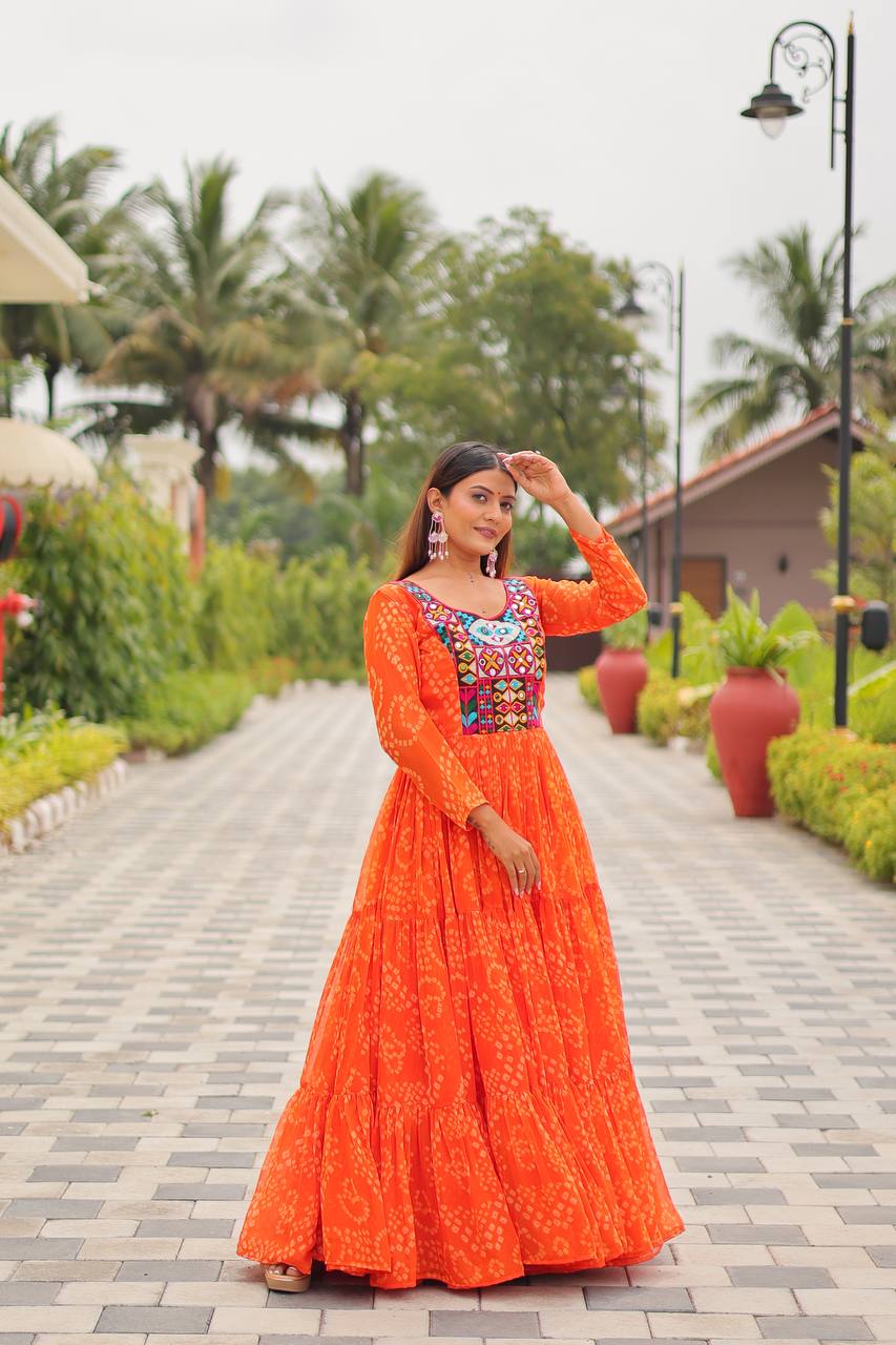 Ravishing Orange Georgette Gamthi Work Gown For Navratri