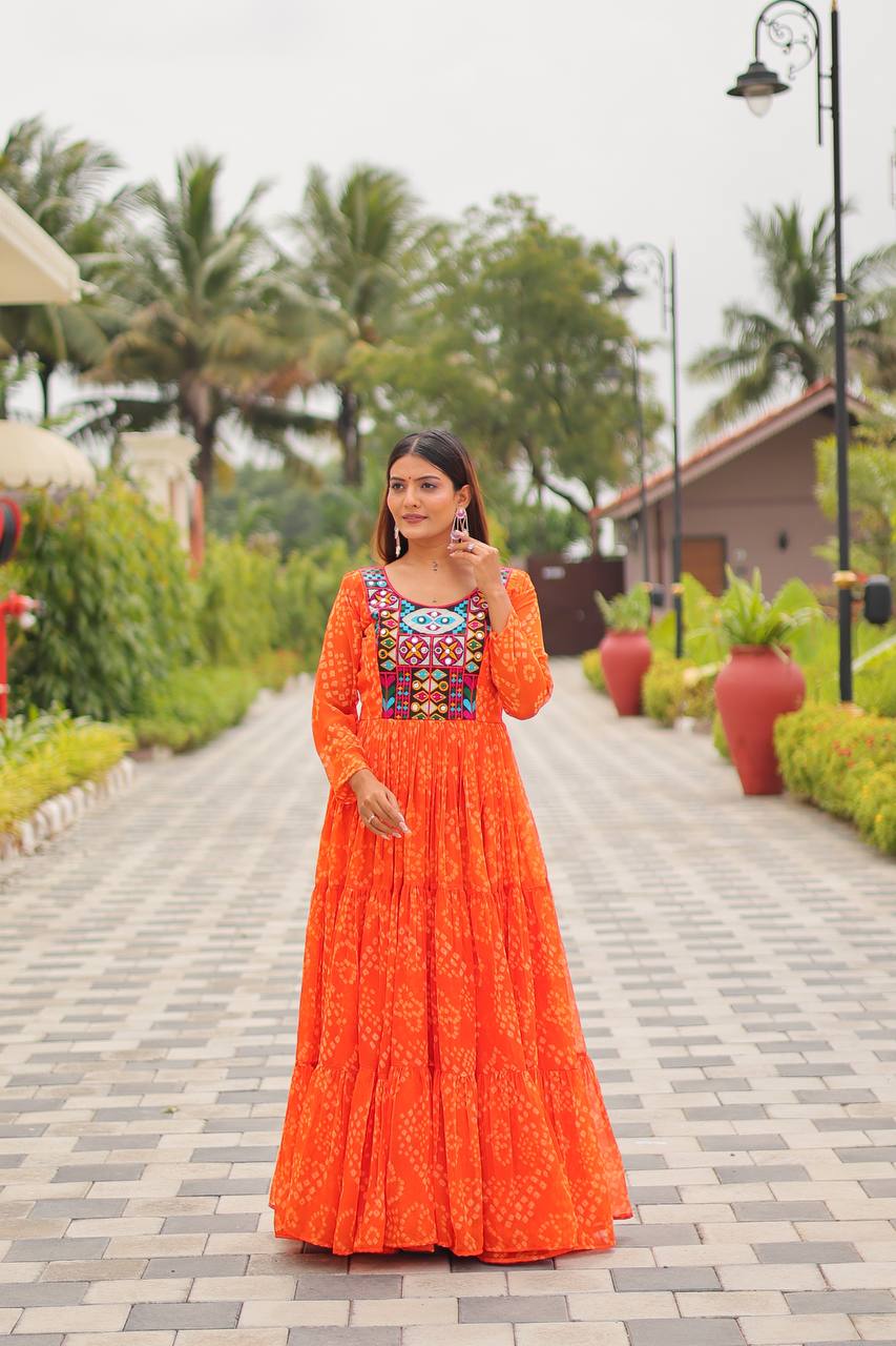 Ravishing Orange Georgette Gamthi Work Gown For Navratri