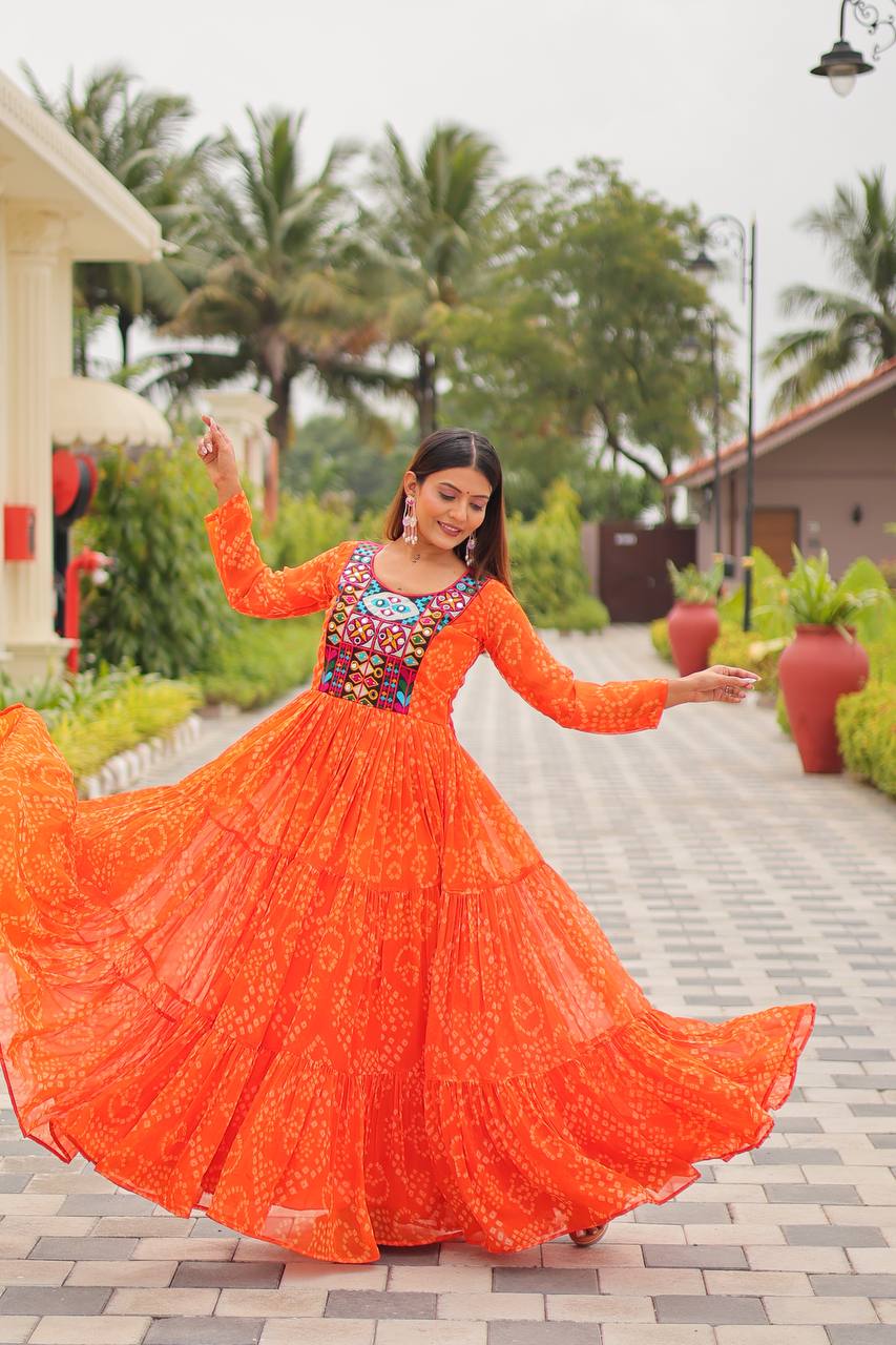 Ravishing Orange Georgette Gamthi Work Gown For Navratri