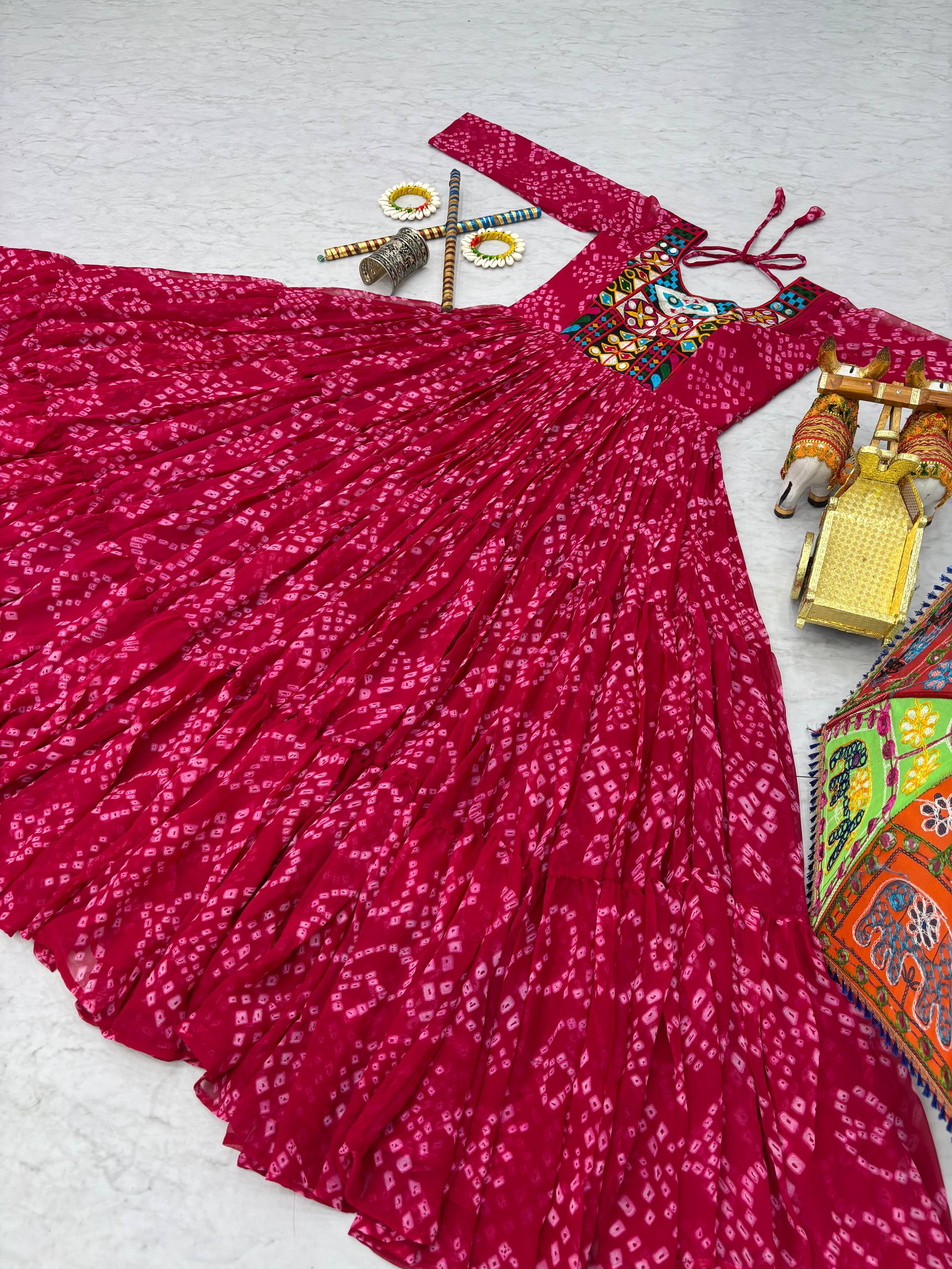 Ravishing Orange Georgette Gamthi Work Gown For Navratri