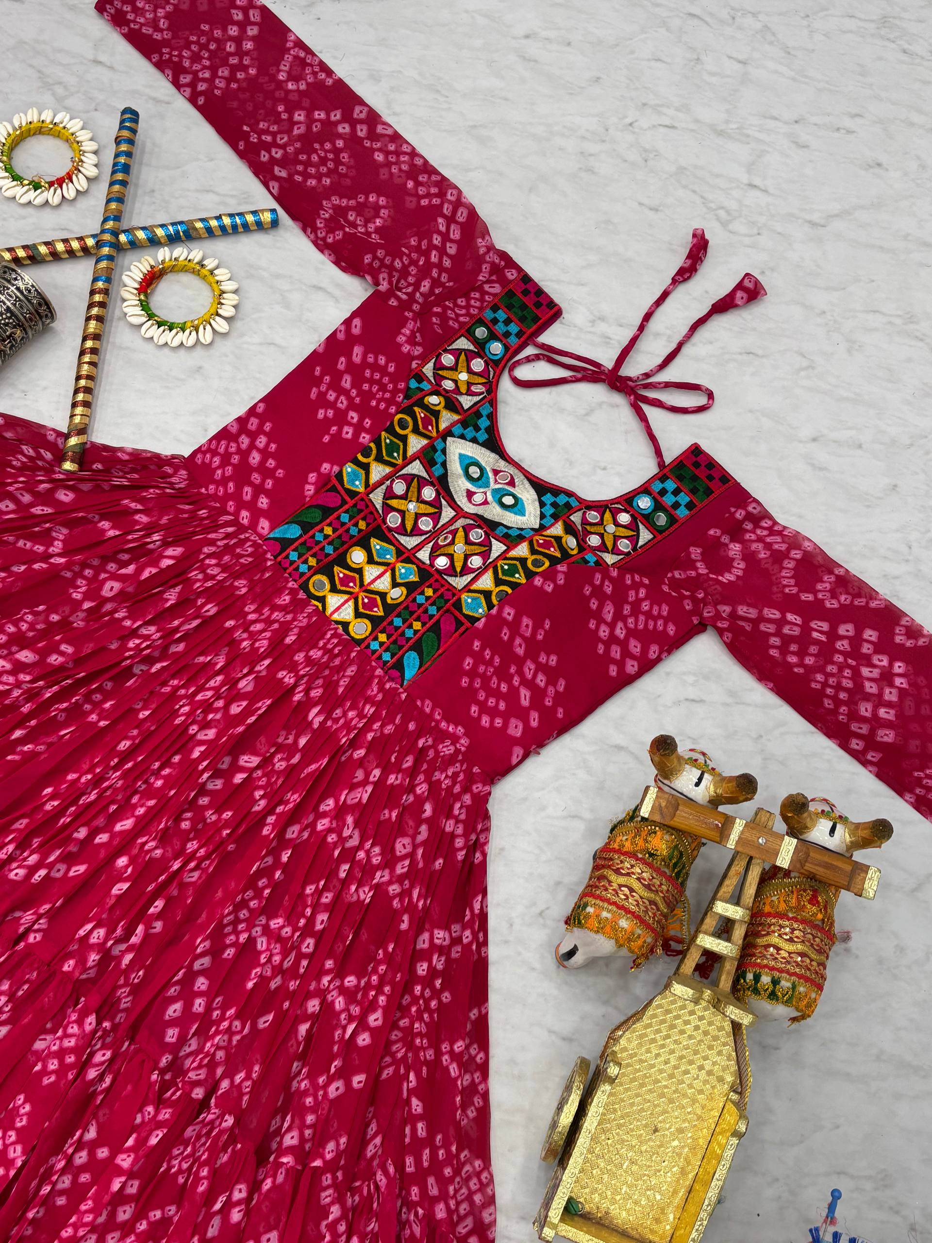 Ravishing Orange Georgette Gamthi Work Gown For Navratri
