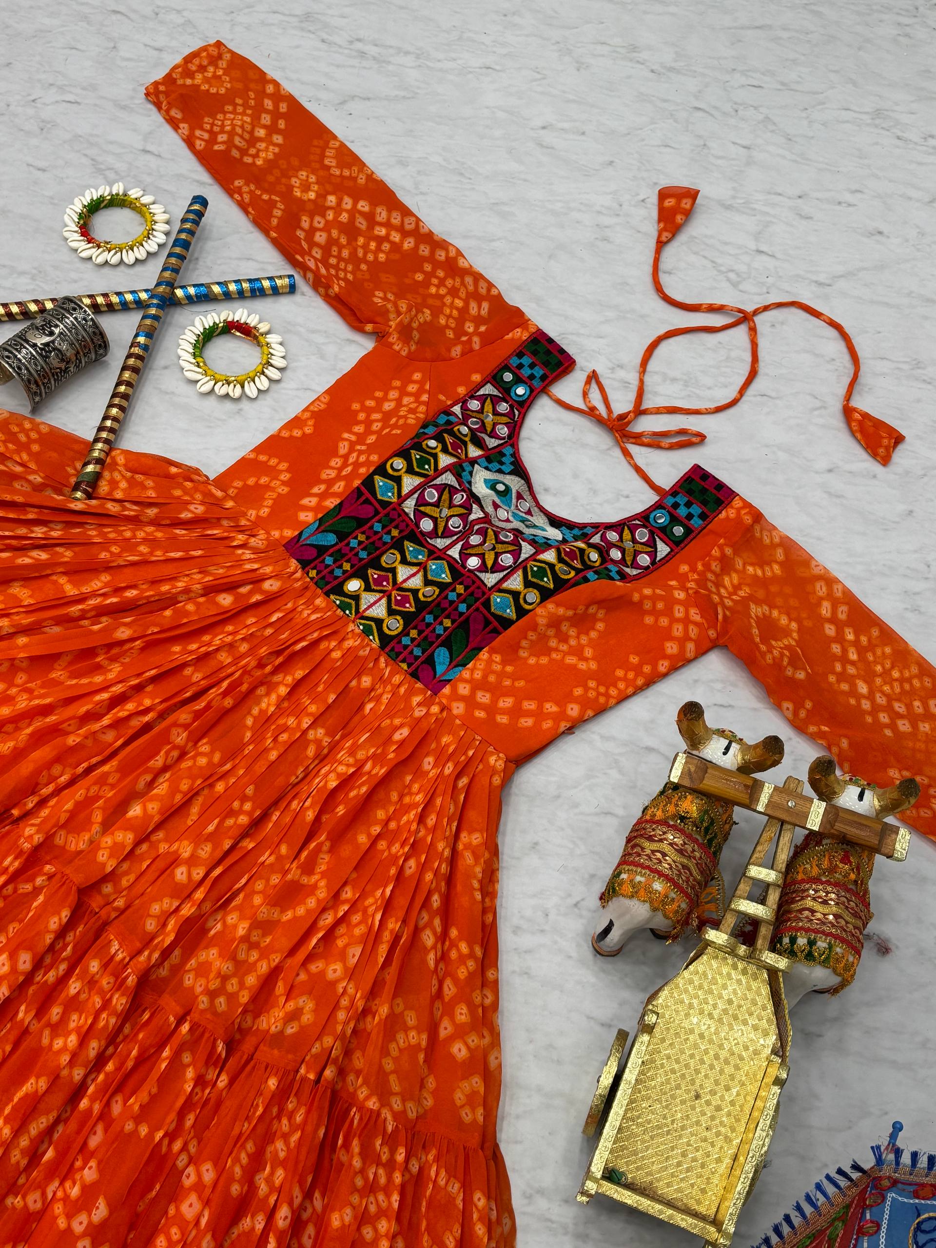 Ravishing Orange Georgette Gamthi Work Gown For Navratri