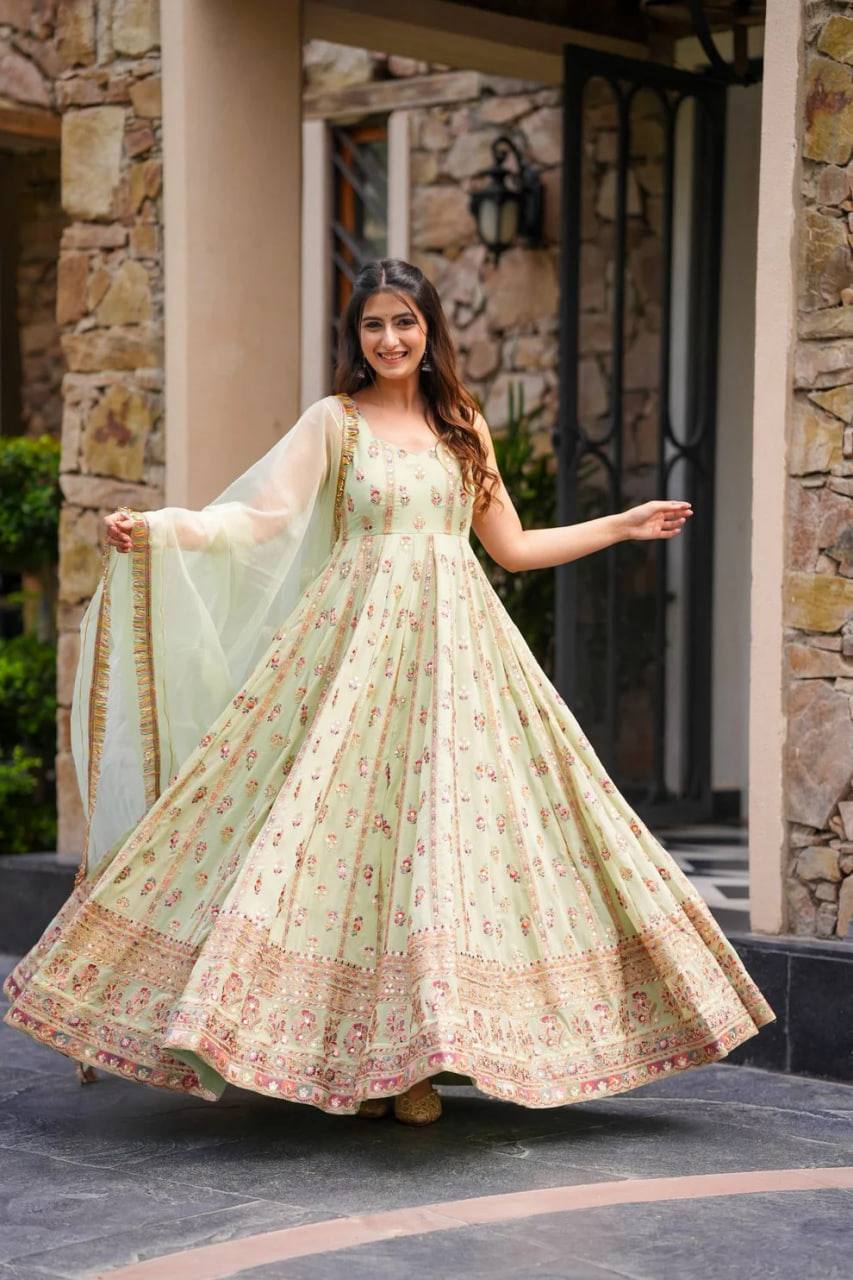 Lovely Peach Georgette Thread Work Gown