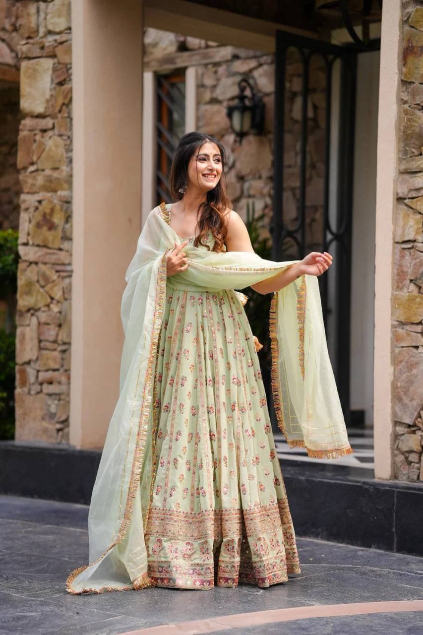 Lovely Peach Georgette Thread Work Gown