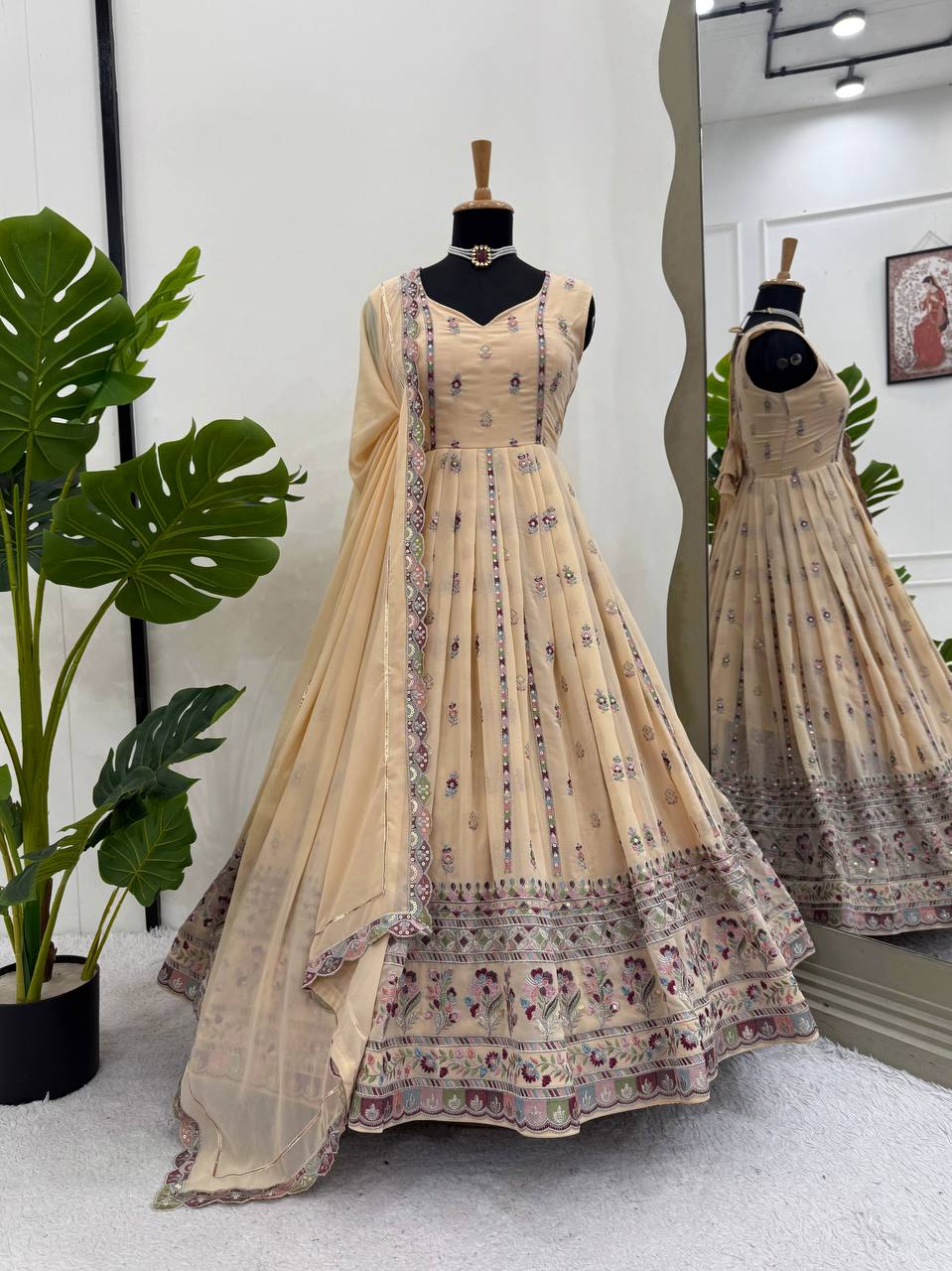 Lovely Peach Georgette Thread Work Gown