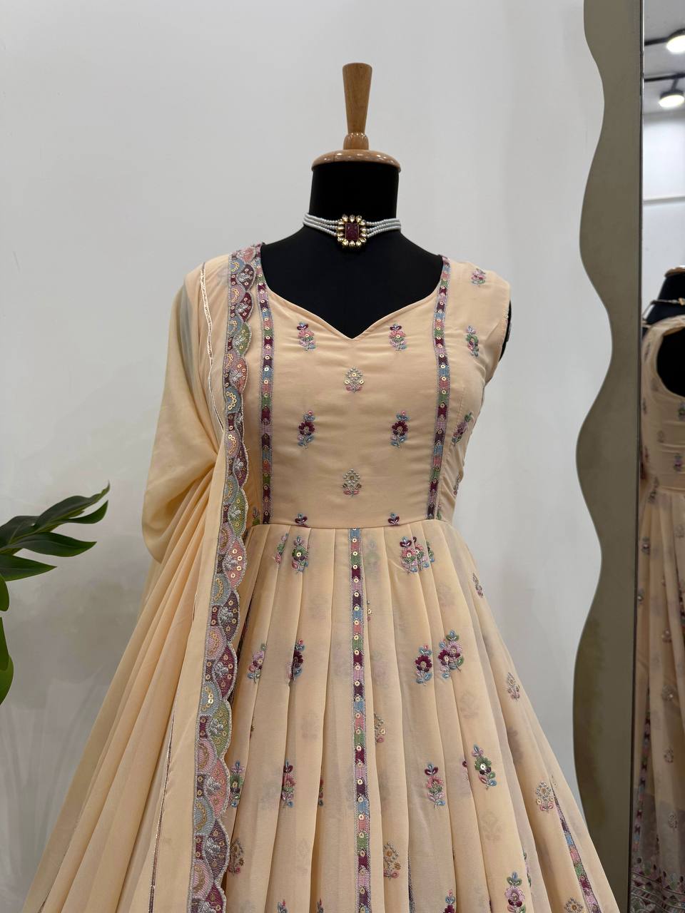 Lovely Peach Georgette Thread Work Gown