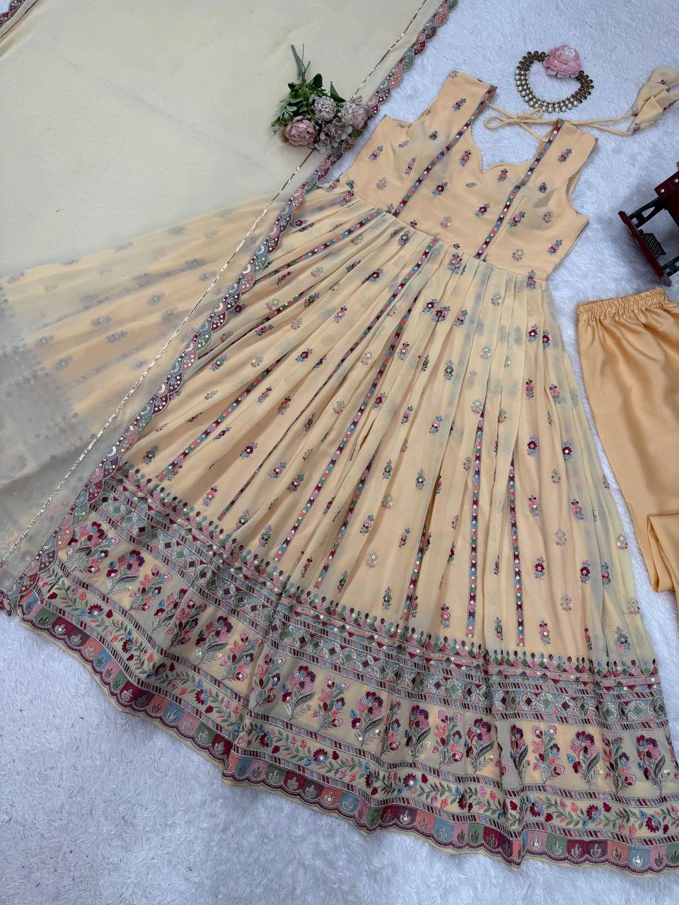 Lovely Peach Georgette Thread Work Gown