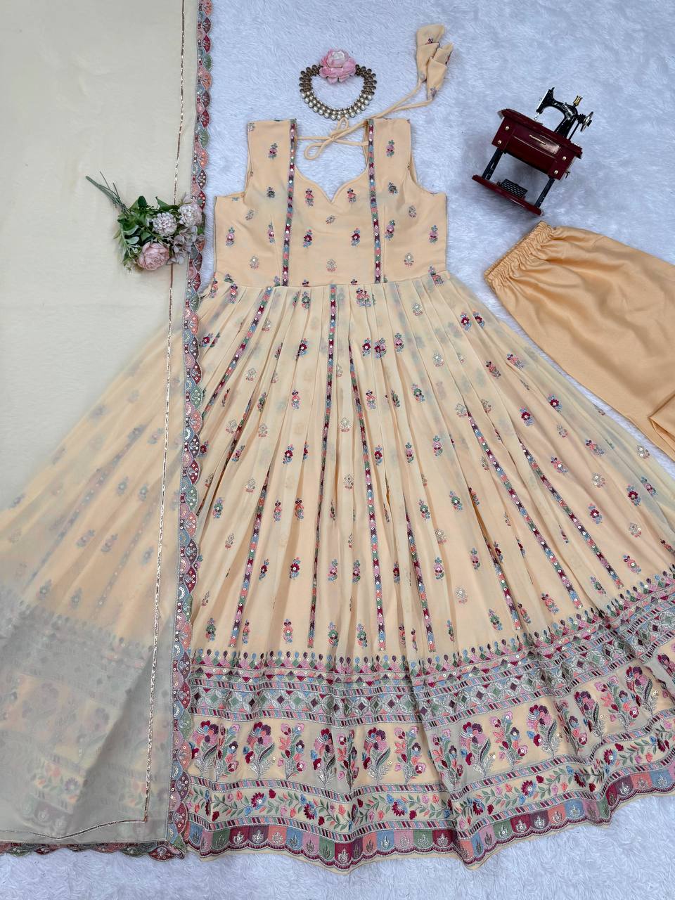 Lovely Peach Georgette Thread Work Gown