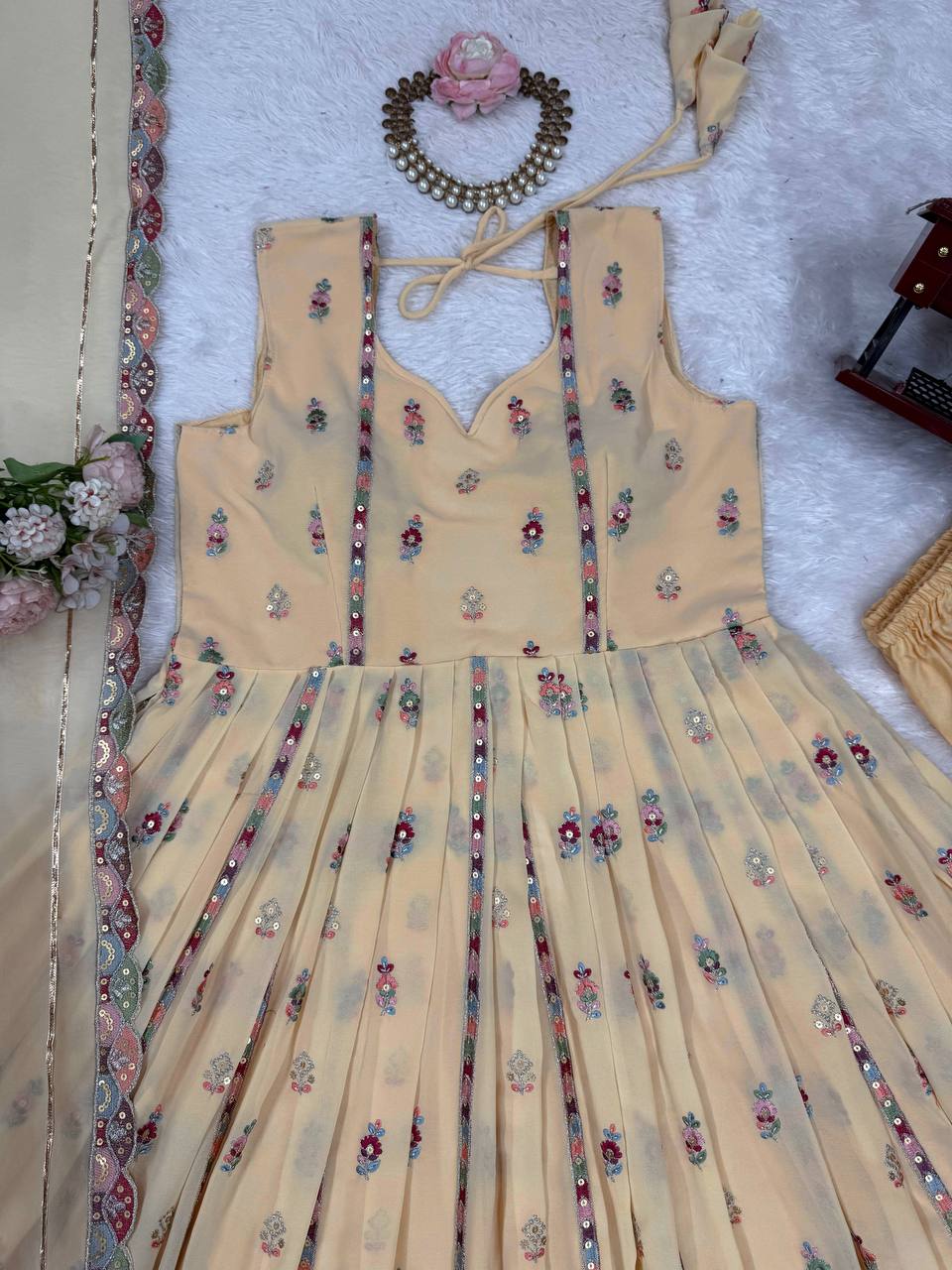Lovely Peach Georgette Thread Work Gown