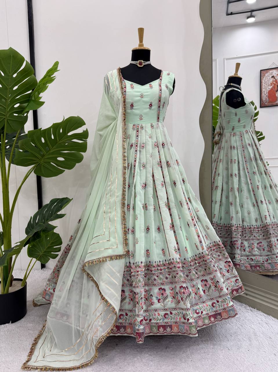 Lovely Peach Georgette Thread Work Gown