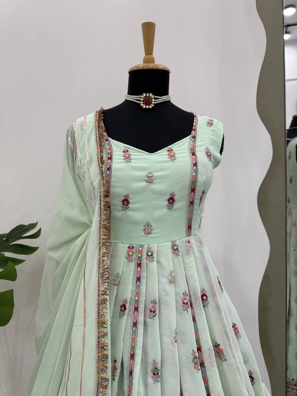 Lovely Peach Georgette Thread Work Gown