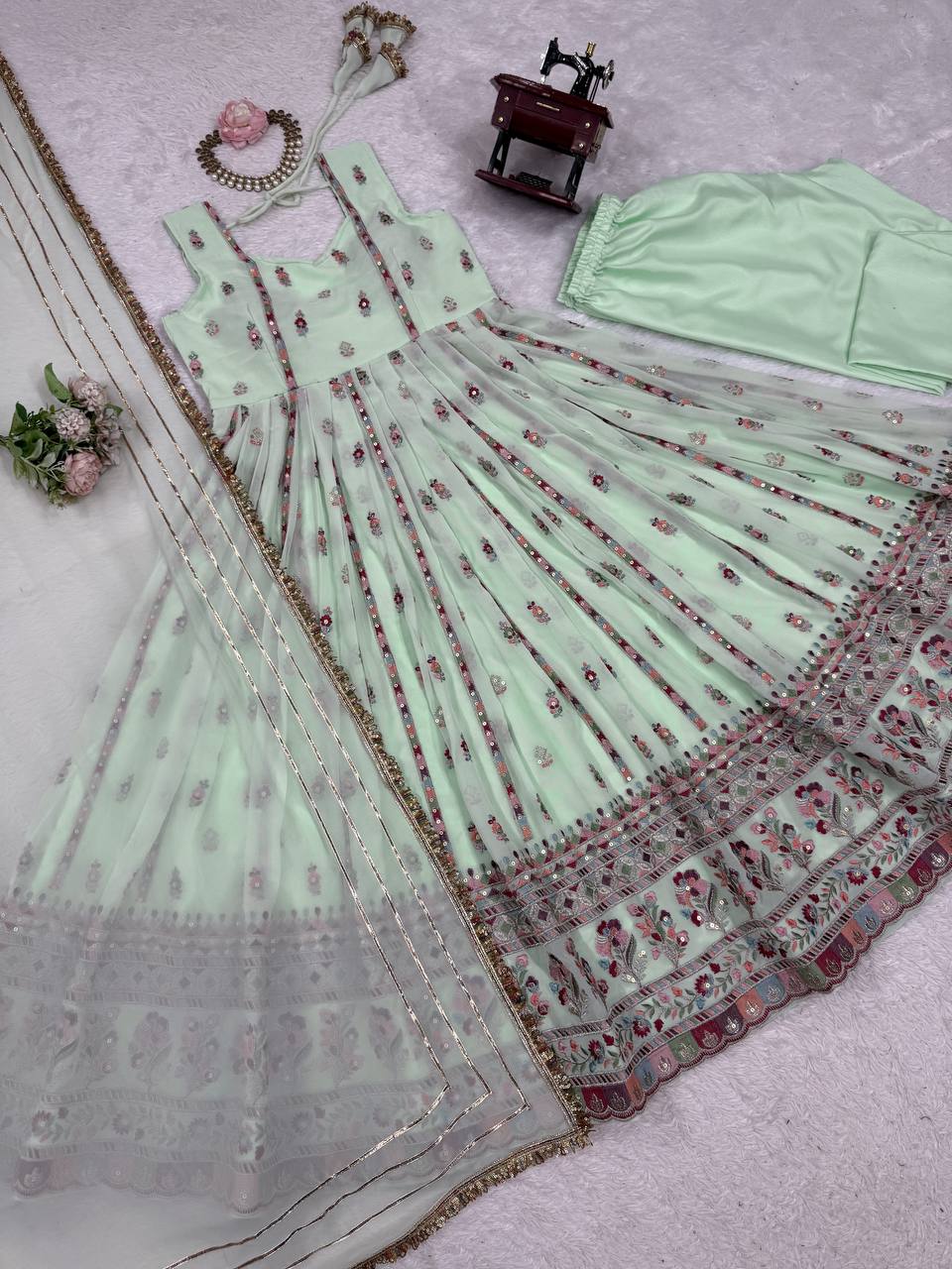 Lovely Peach Georgette Thread Work Gown