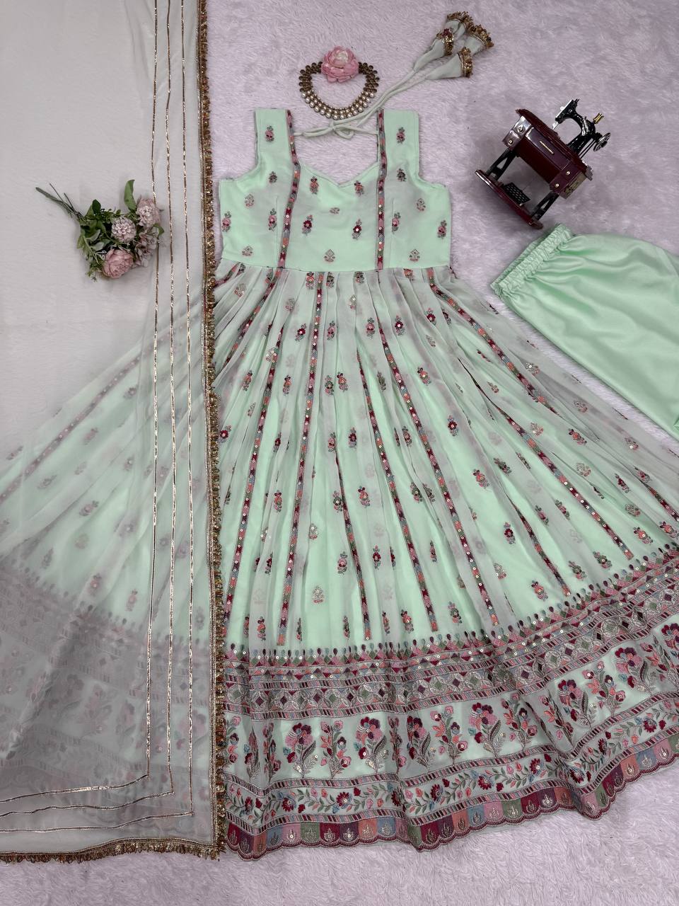 Lovely Peach Georgette Thread Work Gown