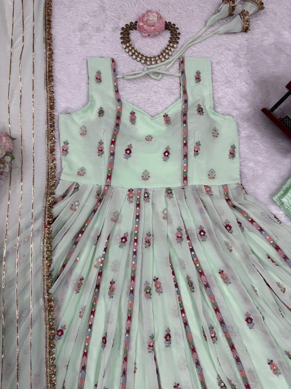 Lovely Peach Georgette Thread Work Gown