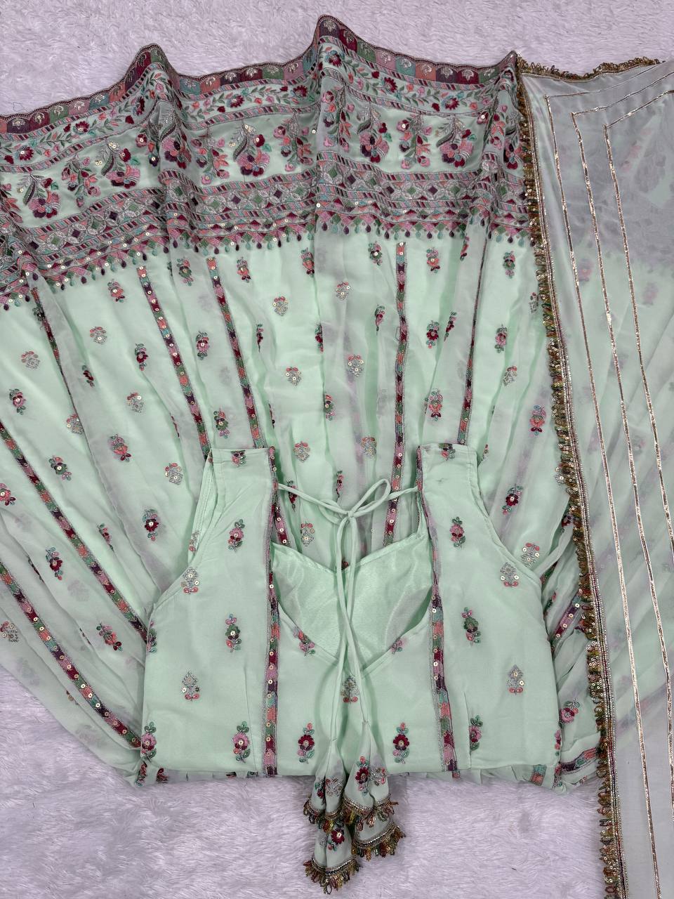 Lovely Peach Georgette Thread Work Gown