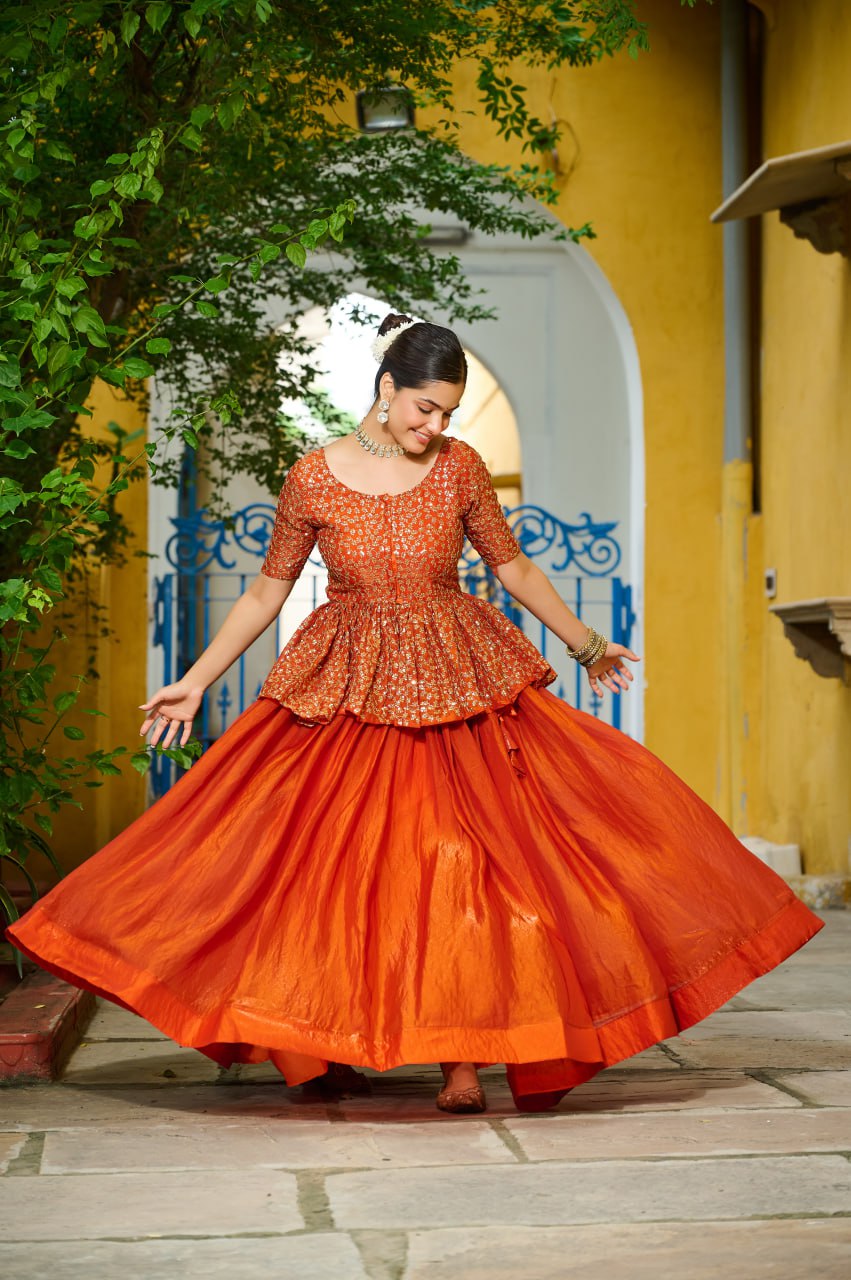 Trendy Orange Fendy Embroidered Top With Lehenga