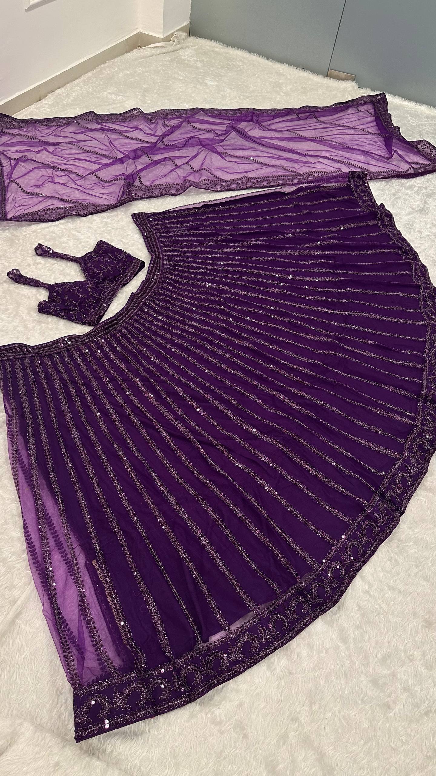 Attractive Purple Net Dori Work Lehenga Choli