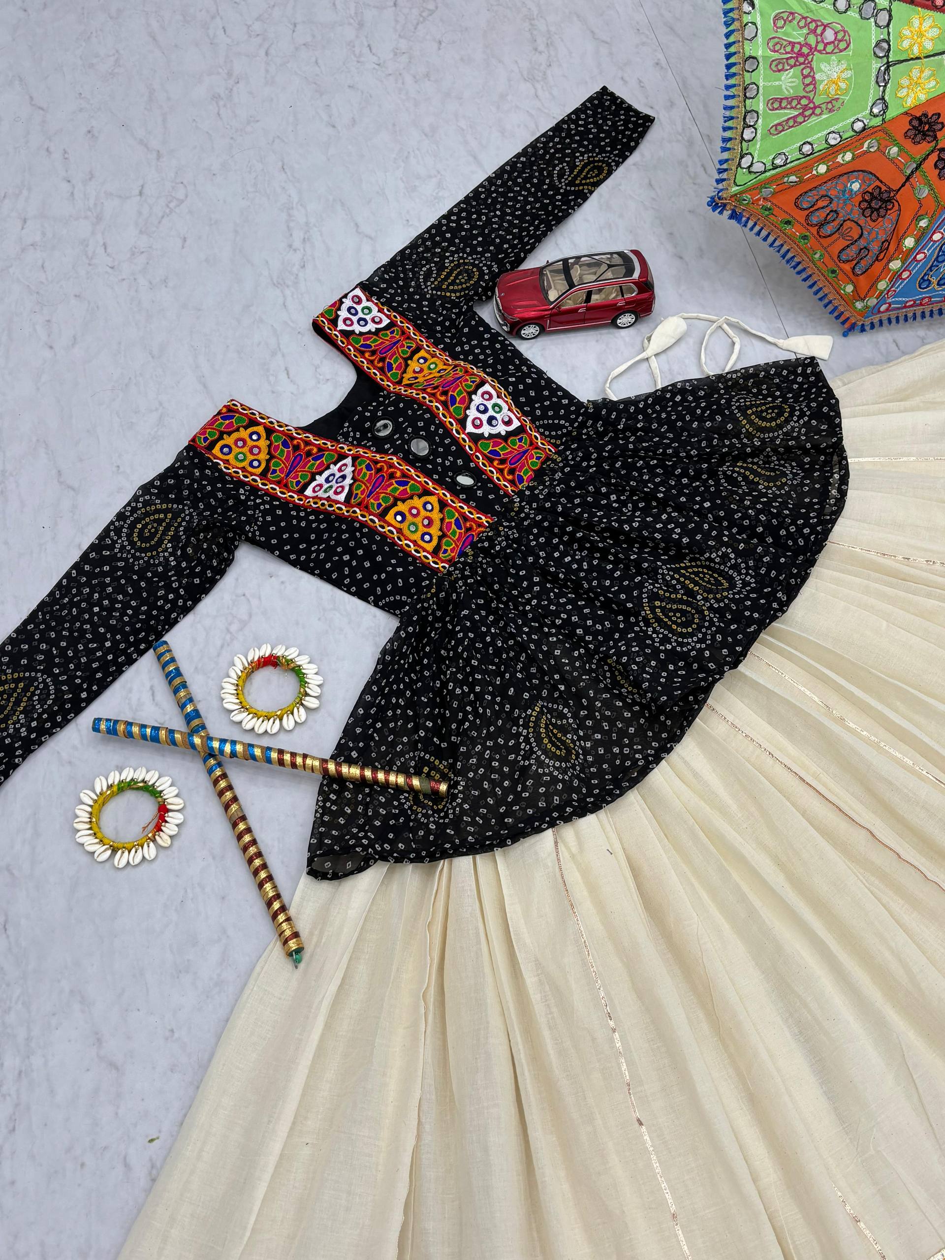 Glorious Black Color Bandhej Print Gamthi Work Lehenga Choli