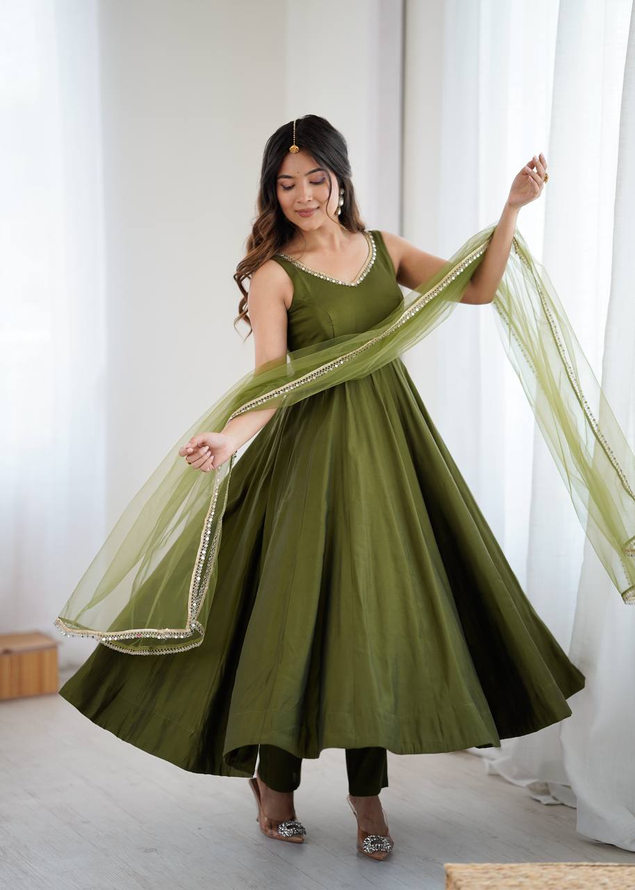 Attractive Mehndi Color Roman Silk Anarkali Suit