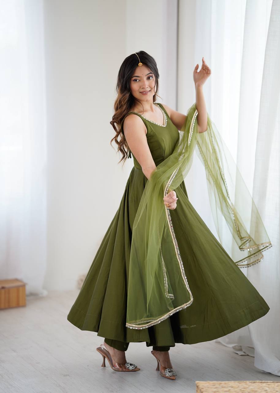 Attractive Mehndi Color Roman Silk Anarkali Suit