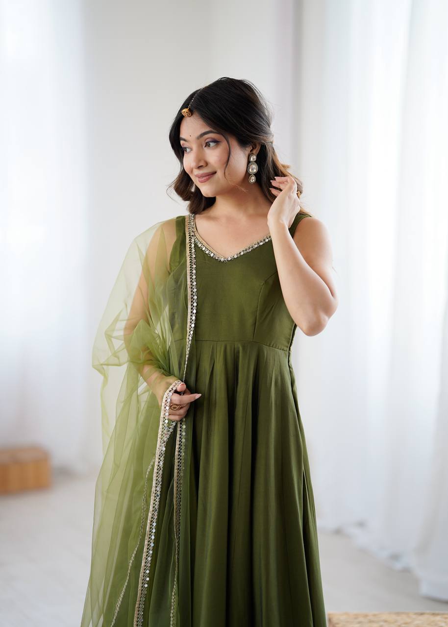 Attractive Mehndi Color Roman Silk Anarkali Suit