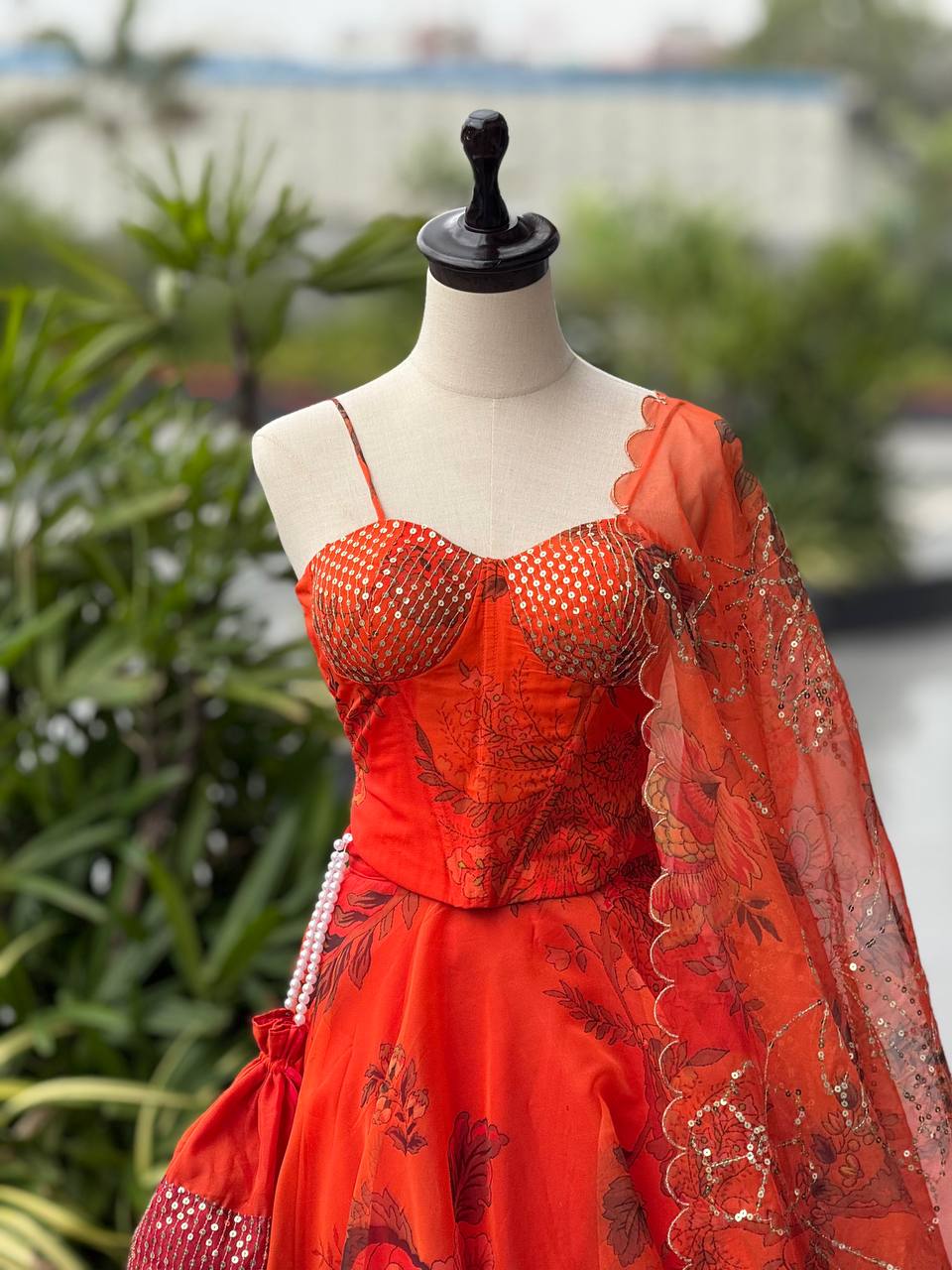 Trendy Orange Color Sequence Work Lehenga Choli