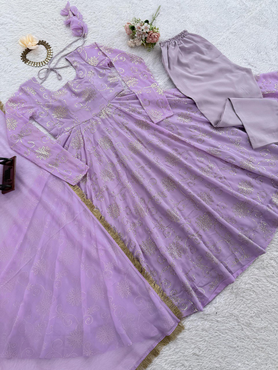 Trendy Lavender Color Georgette Foil Work Gown